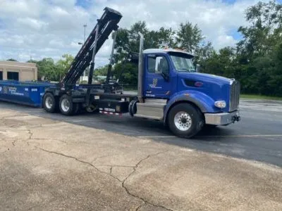 How does a 20-yard roll-off dumpster rental work